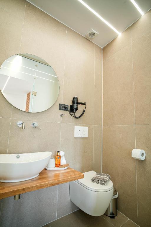 Koupelna v ubytování Omnia Deluxe Rooms