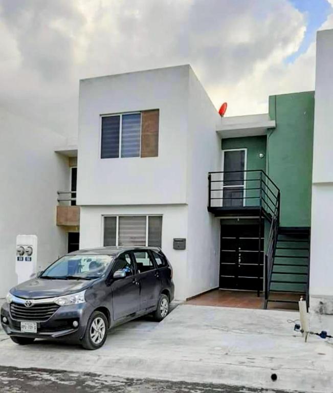 a car parked in front of a house at SIERRA VISTA in Monterrey