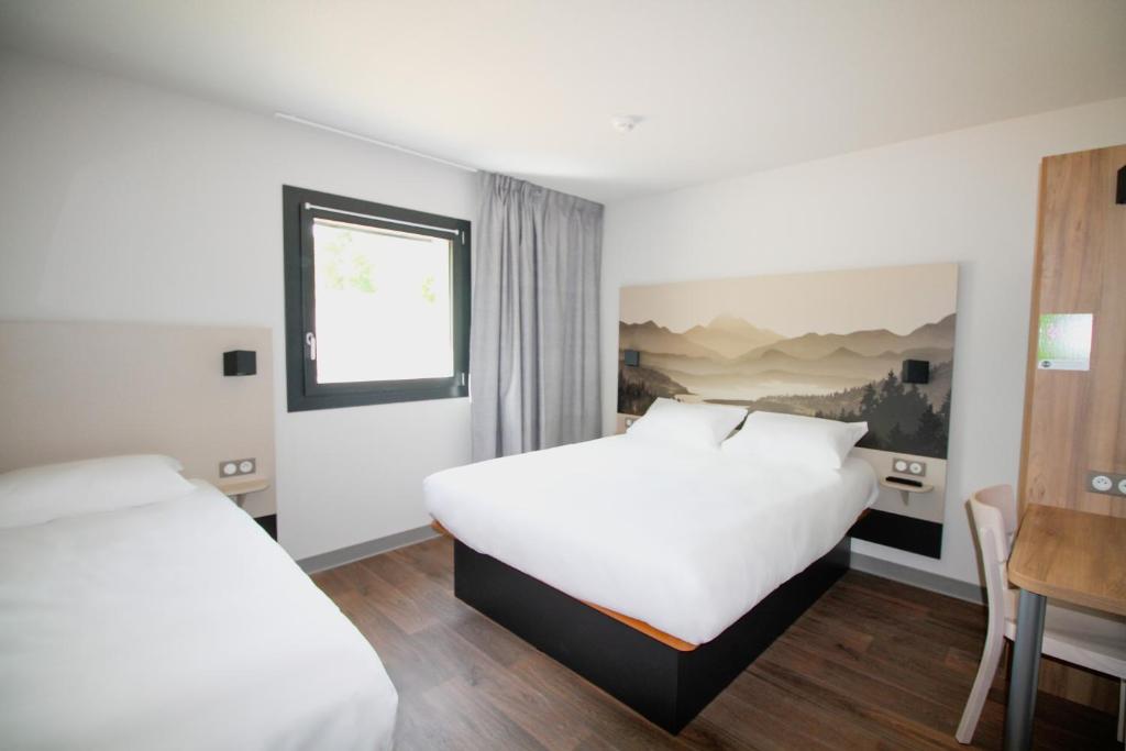 Posteľ alebo postele v izbe v ubytovaní B&B HOTEL Aix-les-Bains