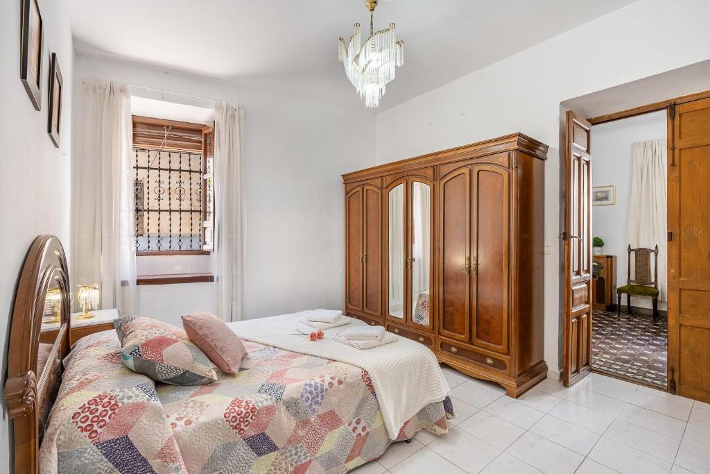 Posteľ alebo postele v izbe v ubytovaní Casa Amelia y Juan de Dios