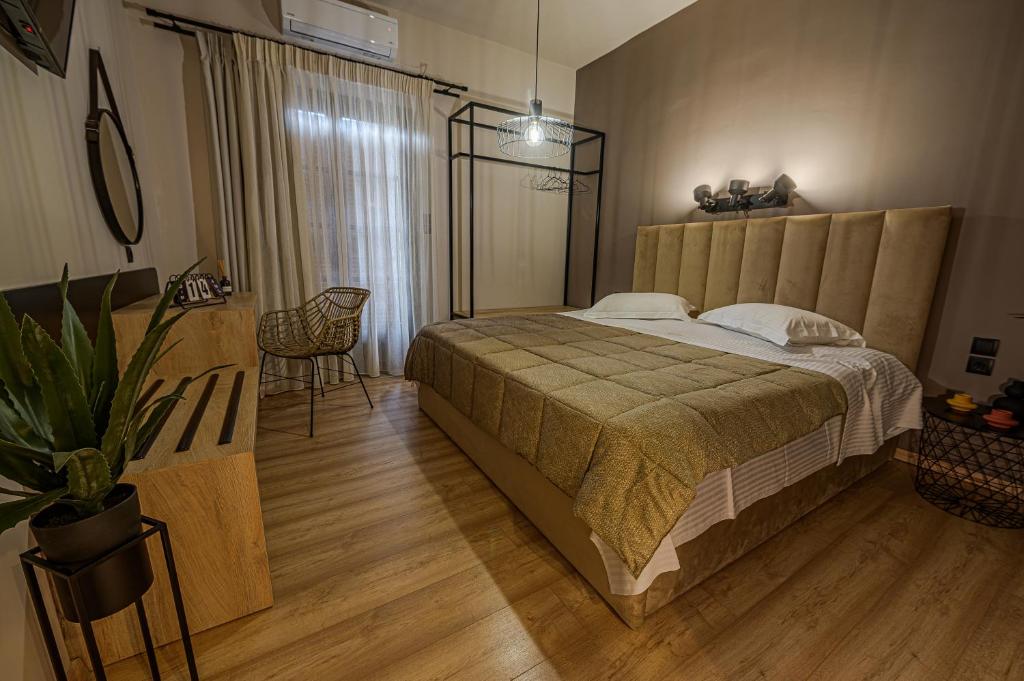 Postel nebo postele na pokoji v ubytování Eleni Zirganou Studios & Apartments