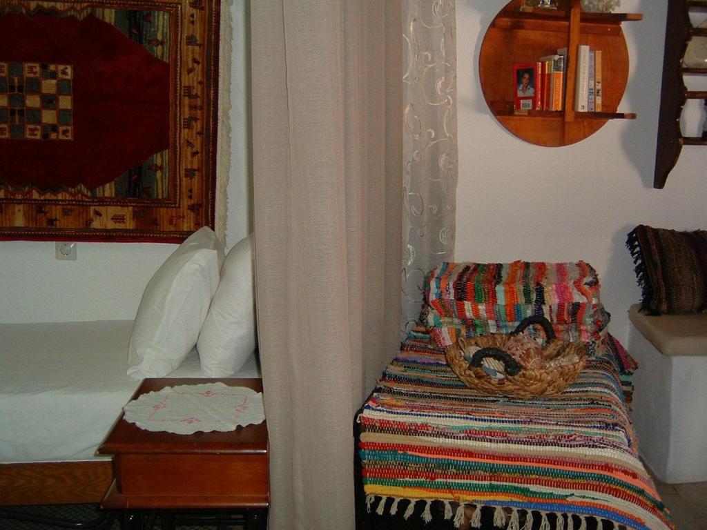 Postel nebo postele na pokoji v ubytování Yiayia's Home