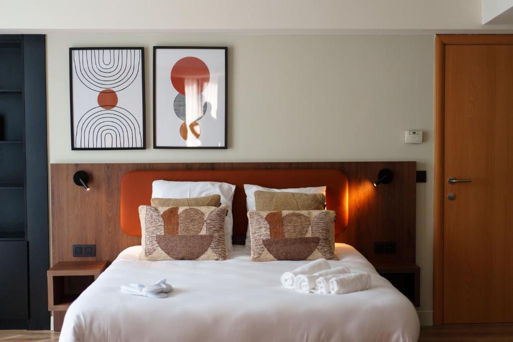 Postel nebo postele na pokoji v ubytování Hotel Les Jardins De La Molignée
