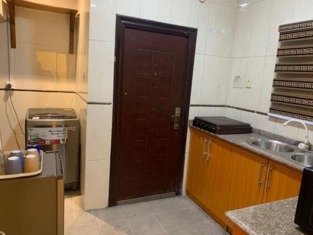 Kuchyň nebo kuchyňský kout v ubytování Rehoboth Homes