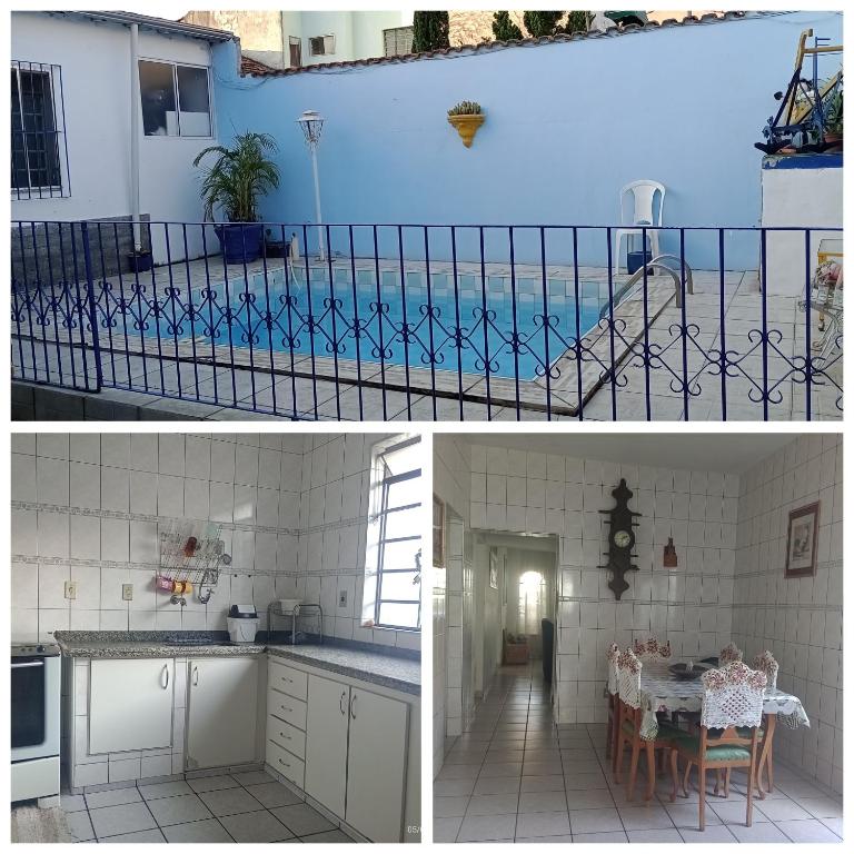 a kitchen and a house with a swimming pool at CASA com ACOMODAÇÃO para 6 PESSOAS in Guaratinguetá