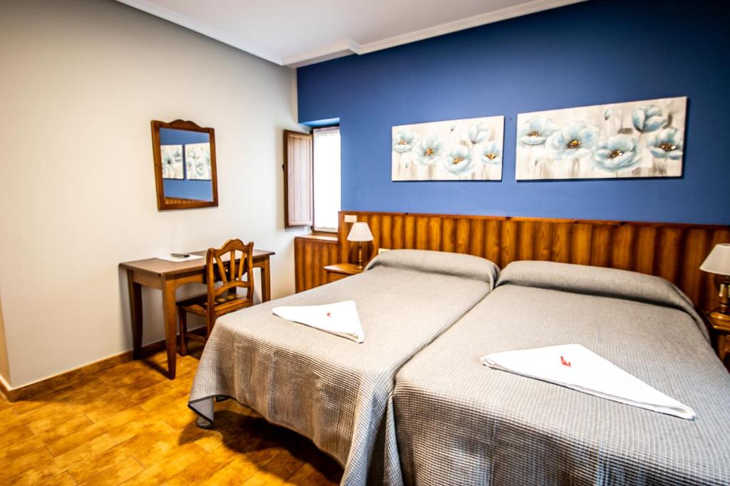 Postel nebo postele na pokoji v ubytování La Casona de Rey