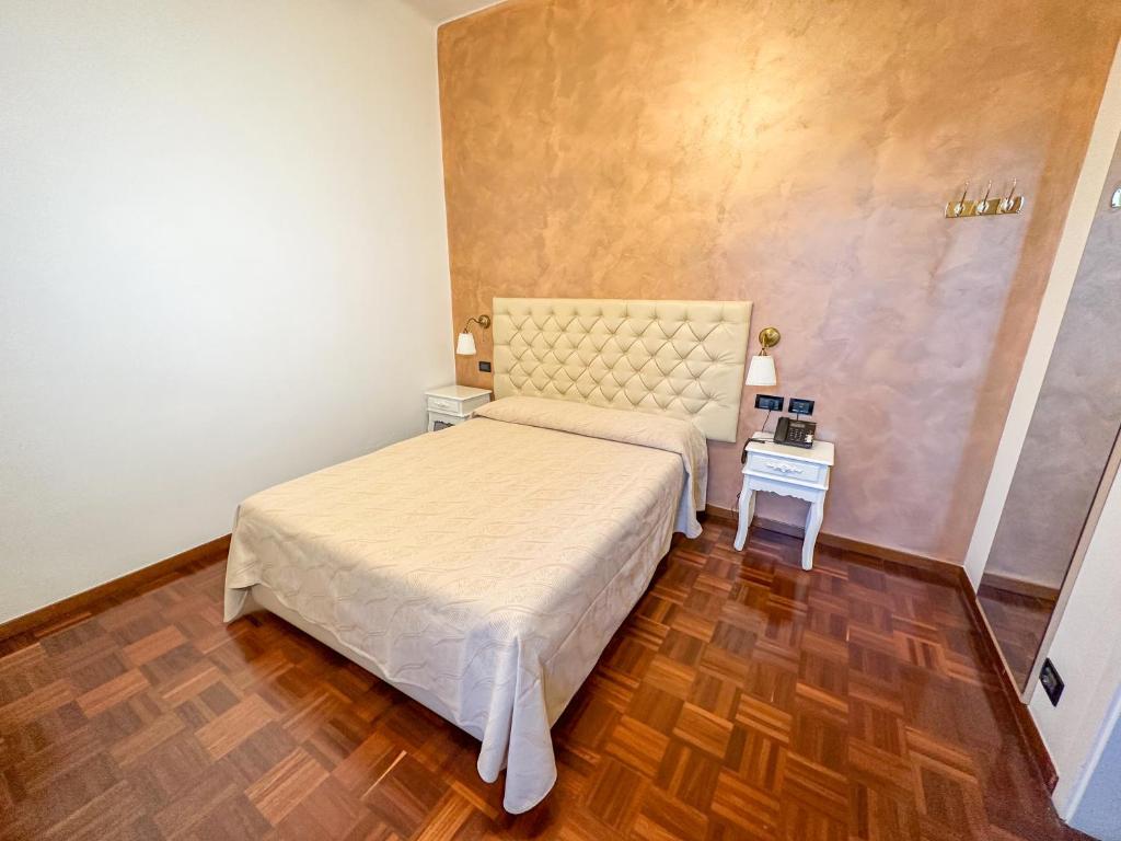 Postel nebo postele na pokoji v ubytování Hotel Dell'Orto