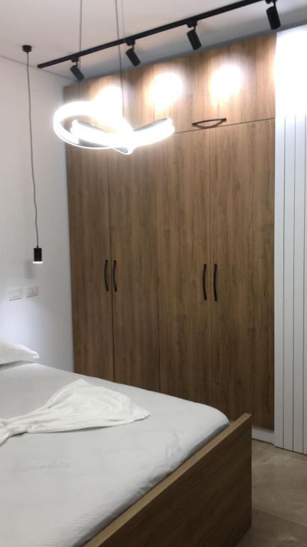Łóżko lub łóżka w pokoju w obiekcie Illyrian Elite Gjiri i Lalezit