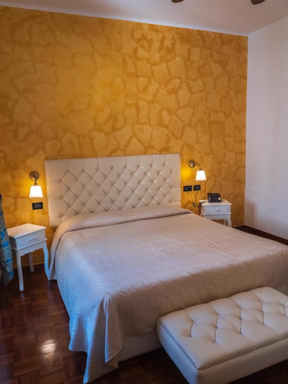 Postel nebo postele na pokoji v ubytování Hotel Dell'Orto