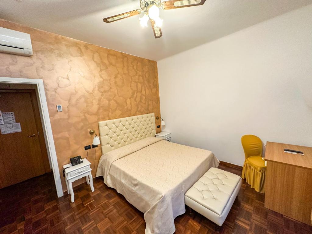 Postel nebo postele na pokoji v ubytování Hotel Dell'Orto