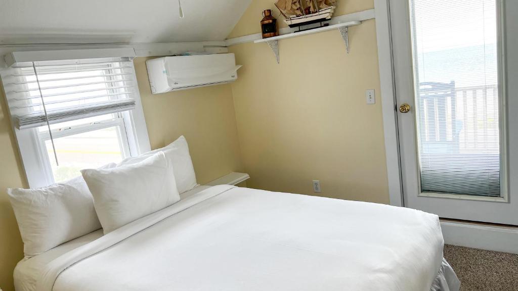 Postel nebo postele na pokoji v ubytování Capricorn House
