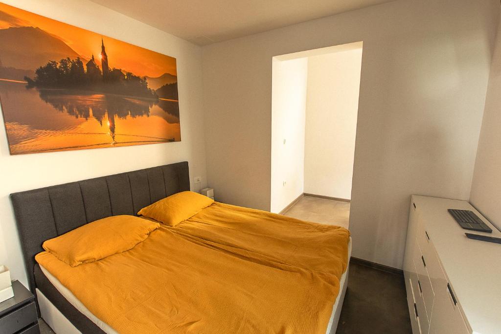 Postel nebo postele na pokoji v ubytování DB Bled Apartment