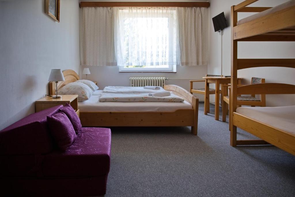 Postel nebo postele na pokoji v ubytování Penzion Diana