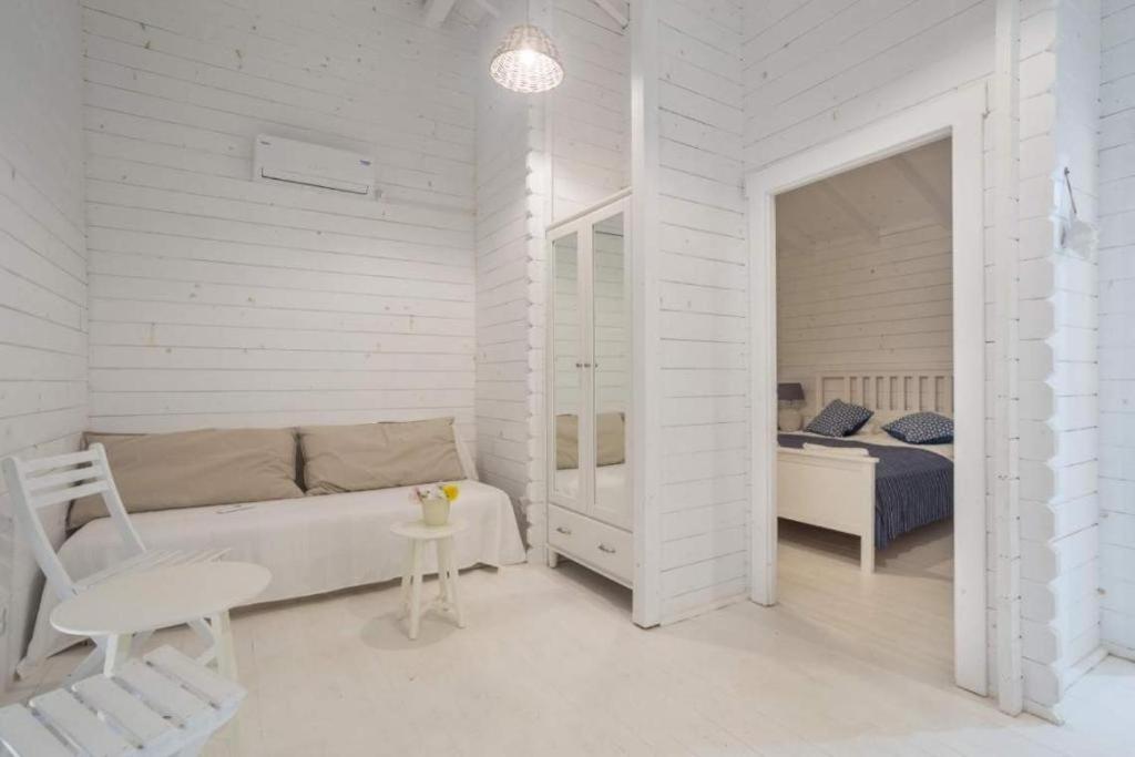 Postel nebo postele na pokoji v ubytování Casa Blanca Olimp