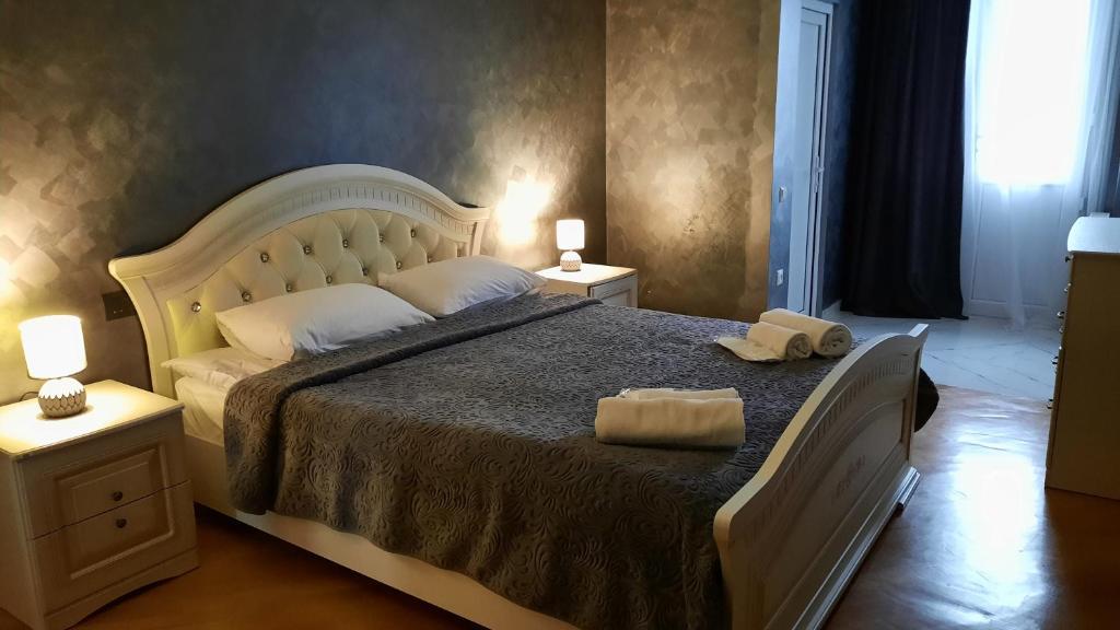 Llit o llits en una habitació de Makos Guest House
