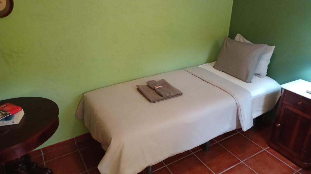 Postel nebo postele na pokoji v ubytování Casa Verde