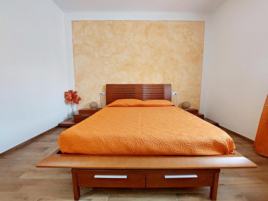 Postel nebo postele na pokoji v ubytování Tuscan Orchard