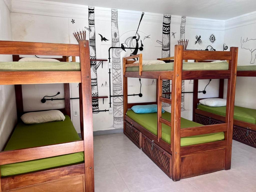 Postel nebo postele na pokoji v ubytování Na Casa 11 - Pousada e Hostel