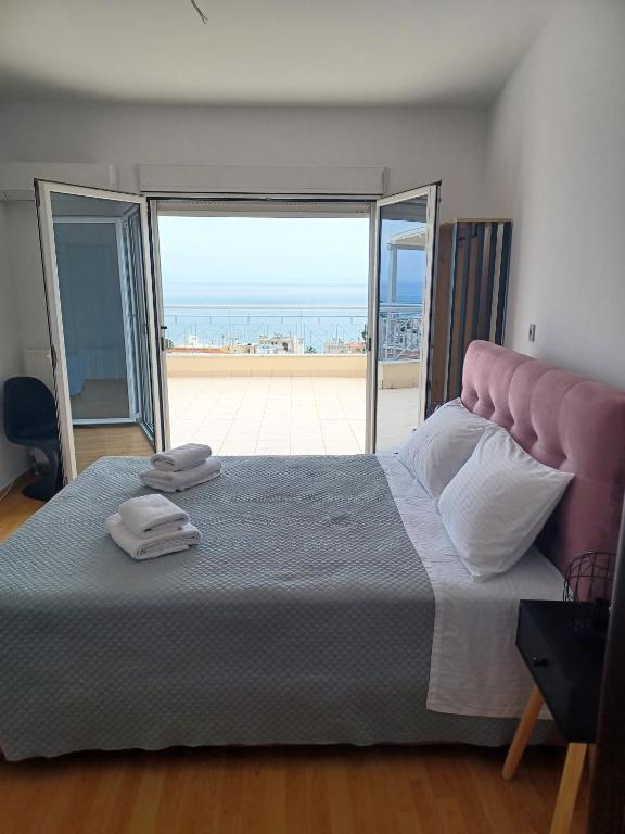 Postel nebo postele na pokoji v ubytování Stargaze Apartment with Sea View