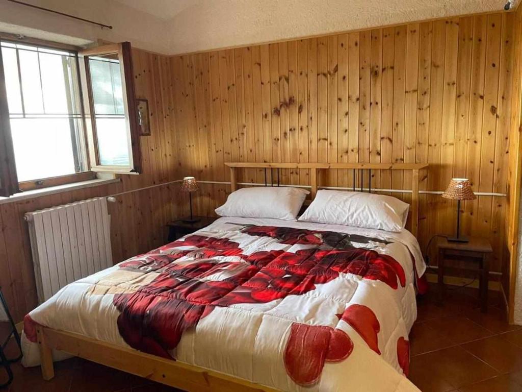 Ένα ή περισσότερα κρεβάτια σε δωμάτιο στο Casa Vacanza Le Viste