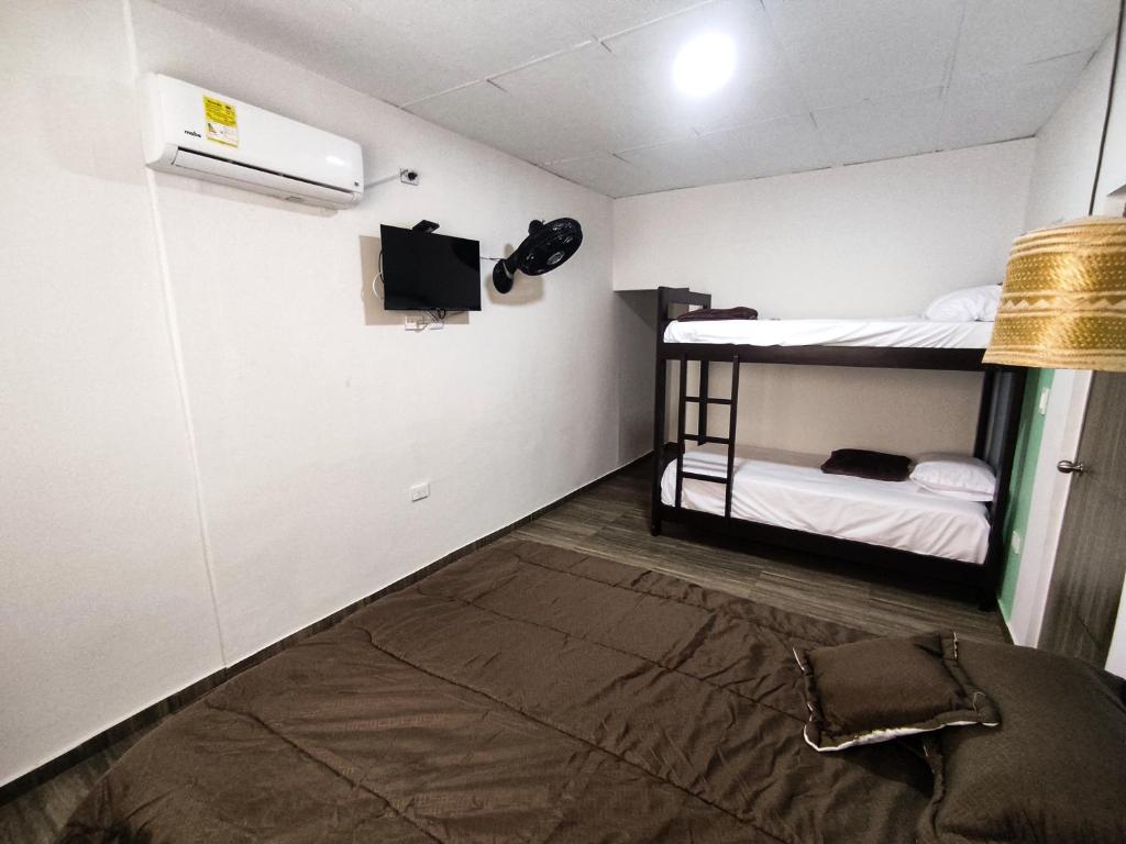 Postel nebo postele na pokoji v ubytování Guajira House