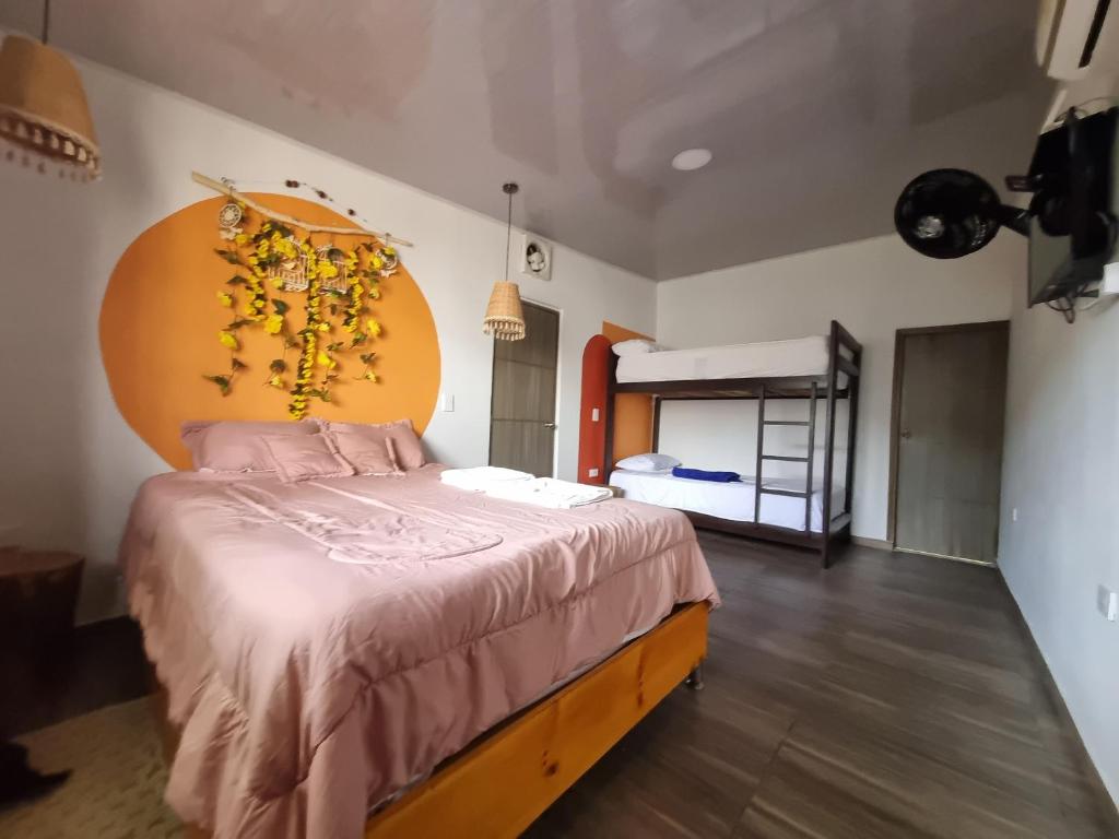Postel nebo postele na pokoji v ubytování Guajira House