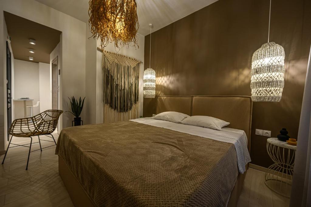 Postel nebo postele na pokoji v ubytování Eleni Zirganou Studios & Apartments