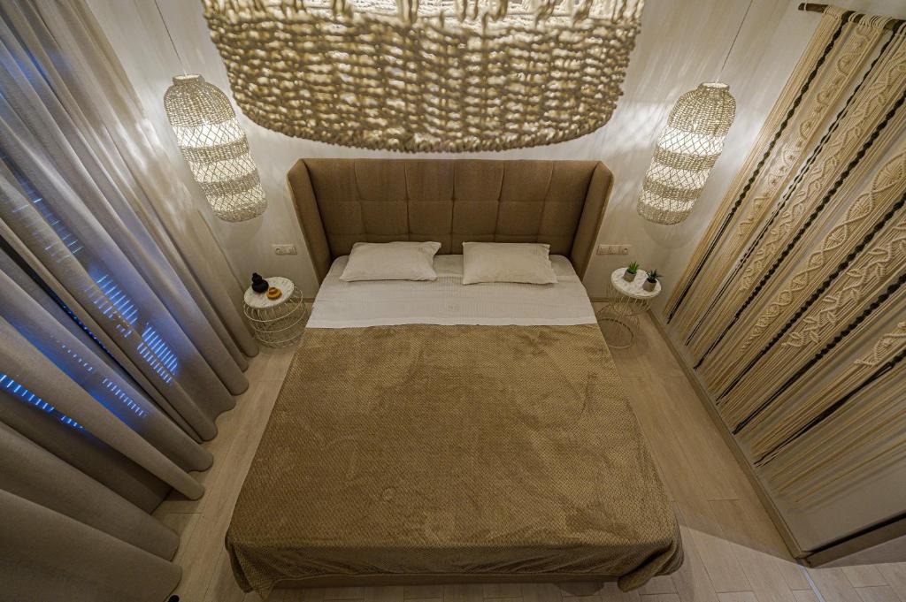 Postel nebo postele na pokoji v ubytování Eleni Zirganou Studios & Apartments