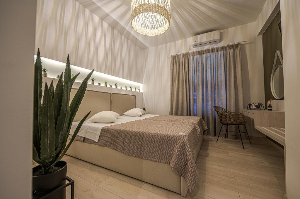 Postel nebo postele na pokoji v ubytování Eleni Zirganou Studios & Apartments