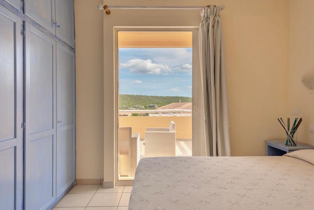 Posteľ alebo postele v izbe v ubytovaní Residence a Golfo di Marinella a 450 mt dal mare