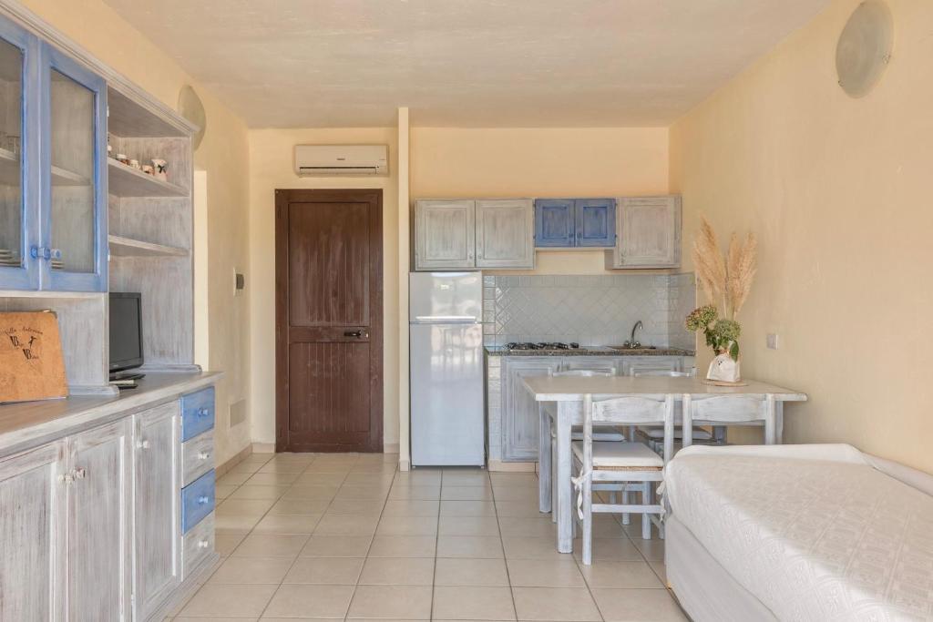 Kuchyňa alebo kuchynka v ubytovaní Residence a Golfo di Marinella a 450 mt dal mare