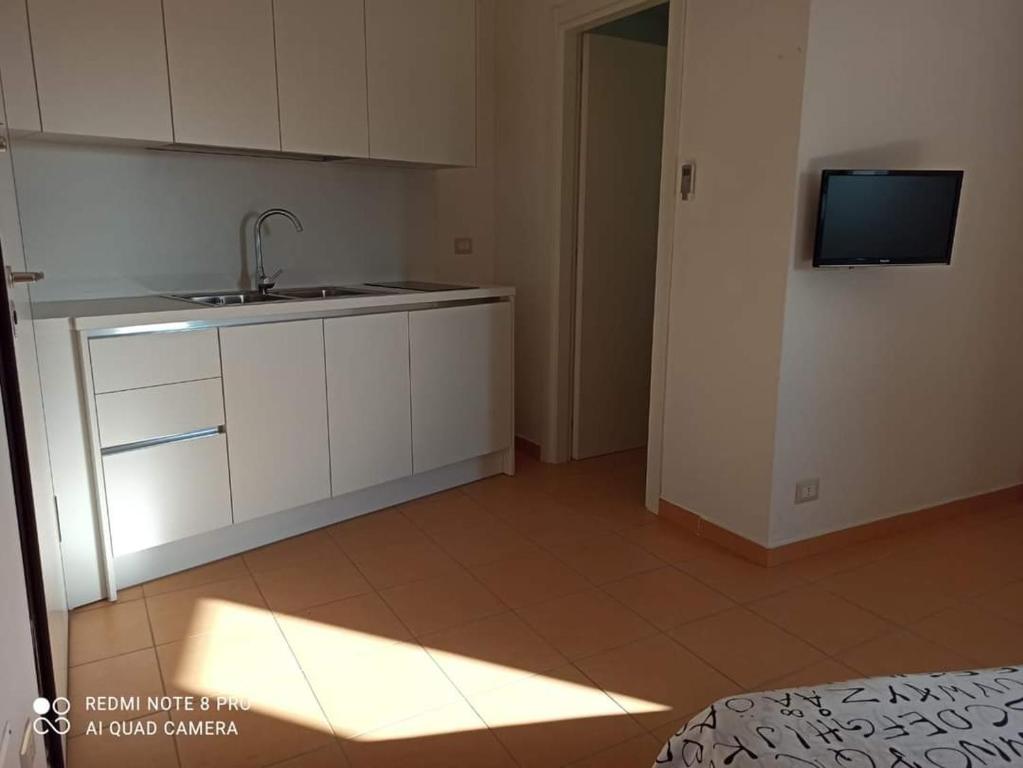 Kuchyň nebo kuchyňský kout v ubytování Pitagora Residence