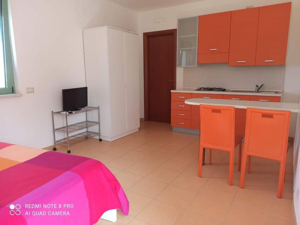 Kuchyň nebo kuchyňský kout v ubytování Pitagora Residence