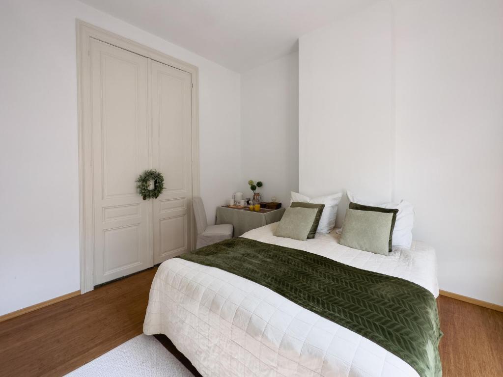 Postel nebo postele na pokoji v ubytování Ambiorix Residence