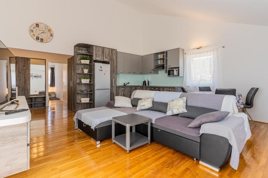 Kuchyňa alebo kuchynka v ubytovaní Apartman Atika