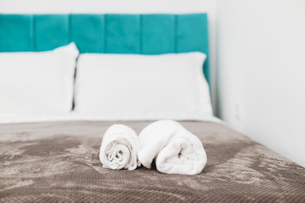 Postel nebo postele na pokoji v ubytování Hotel Tier Center