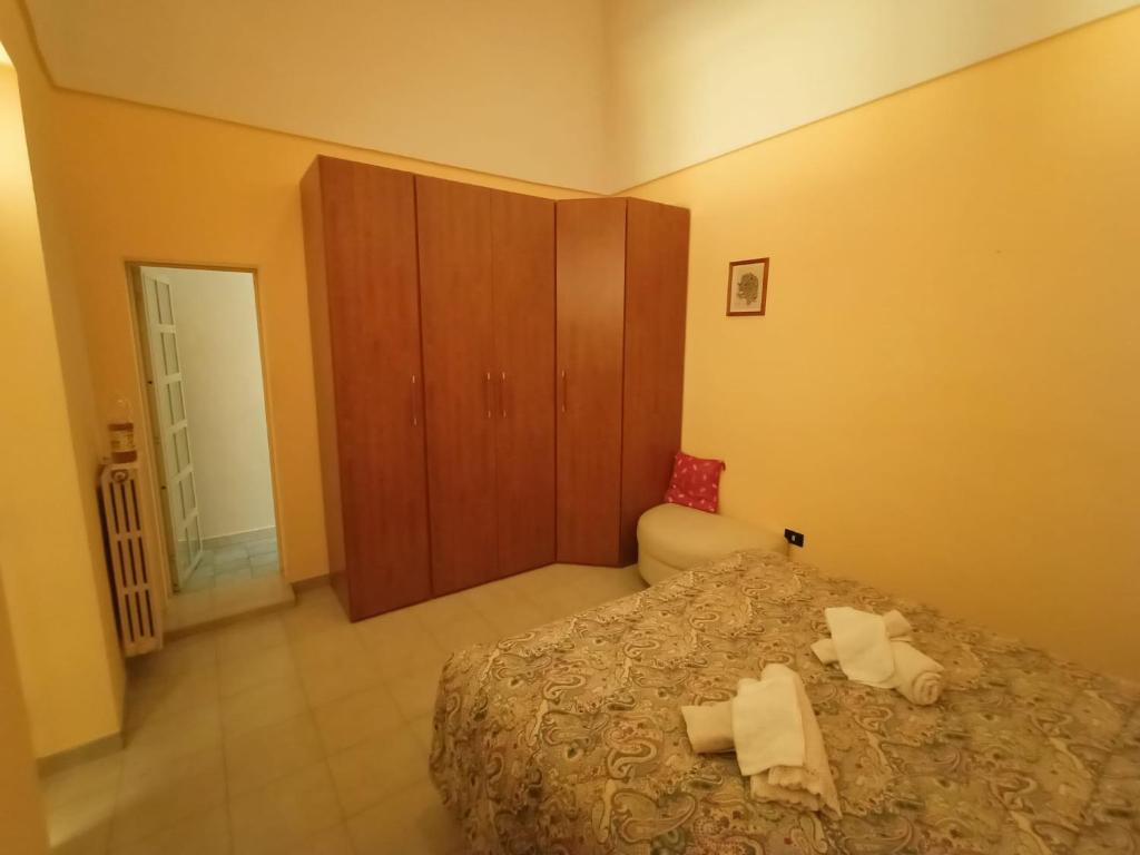 Postel nebo postele na pokoji v ubytování Due passi dal Castello