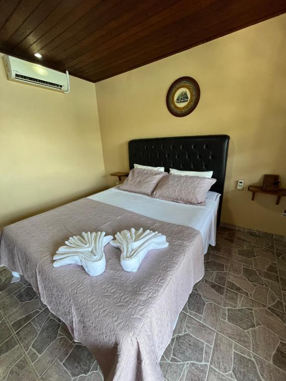 Cama ou camas em um quarto em Pousada Convés - Ilha Grande