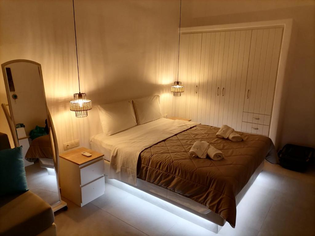 Postel nebo postele na pokoji v ubytování Angel Maisonette and Studio