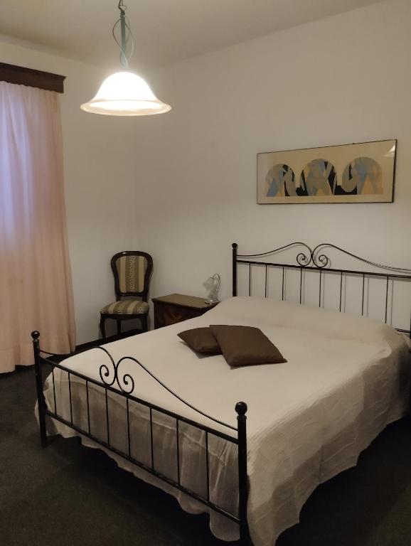 Posteľ alebo postele v izbe v ubytovaní Casa Graziella