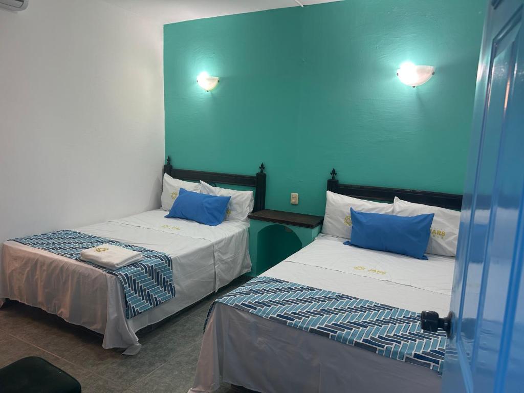 Postel nebo postele na pokoji v ubytování Hotel Jar8 Bule