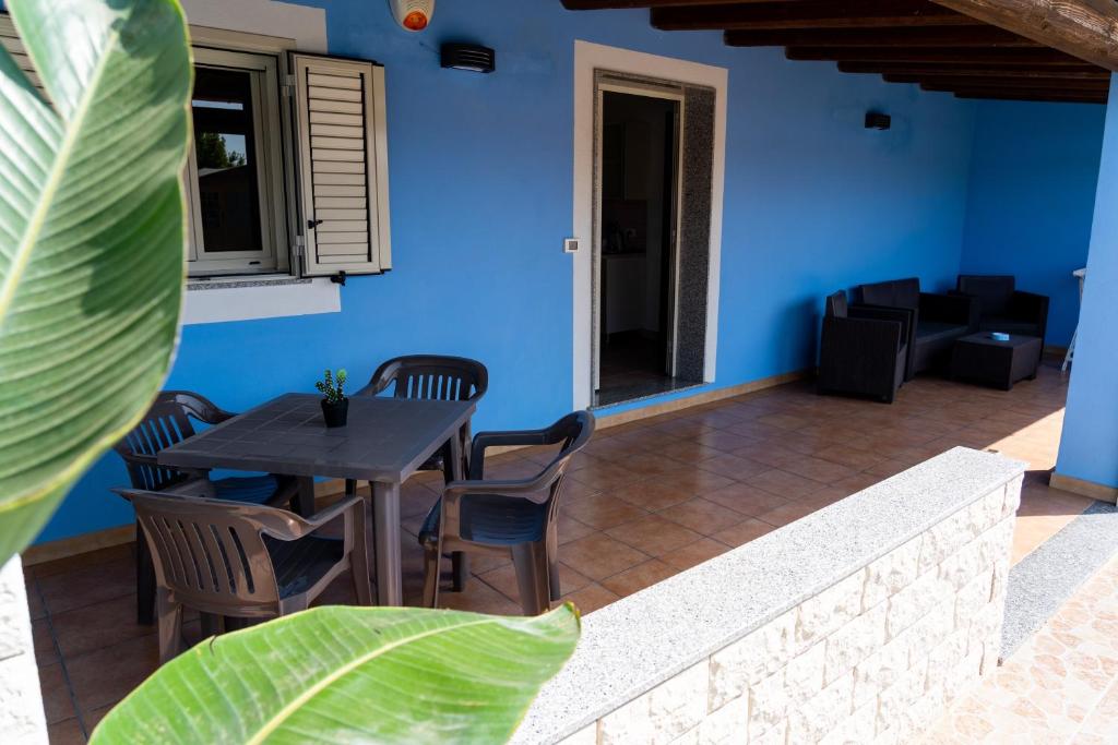 Posezení v ubytování B&B L'Uliveto Rooms & Pool