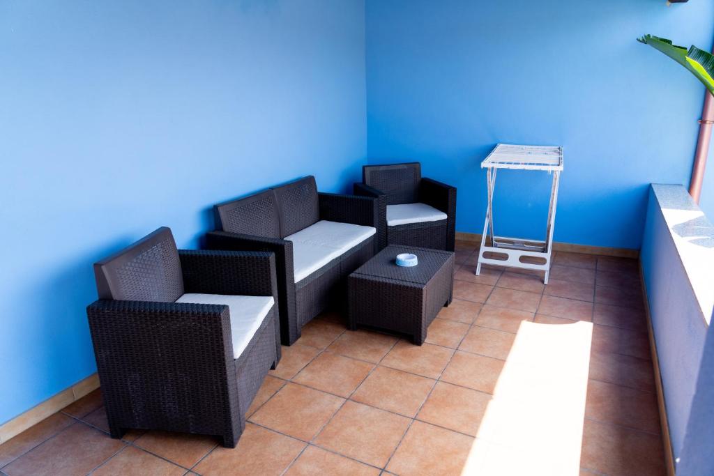 Posezení v ubytování B&B L'Uliveto Rooms & Pool