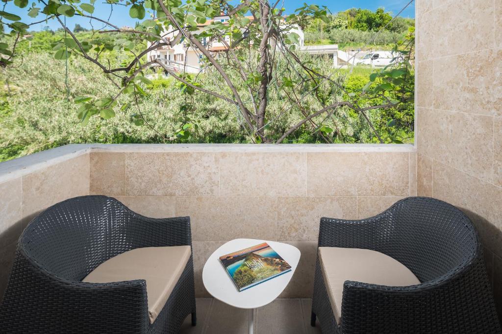 Posezení v ubytování Hotel Tomi