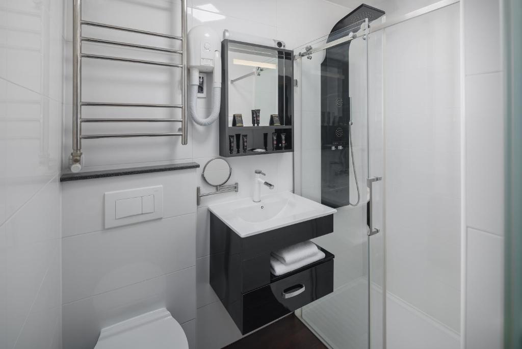 Koupelna v ubytování Hotel Tomi
