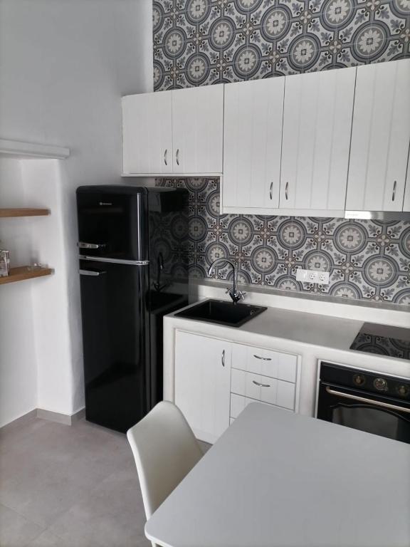 Kuchyň nebo kuchyňský kout v ubytování Angel Maisonette and Studio