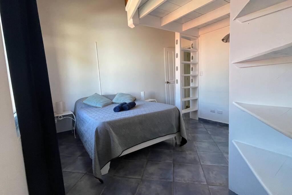 Postel nebo postele na pokoji v ubytování Cabarete Beach Apartment