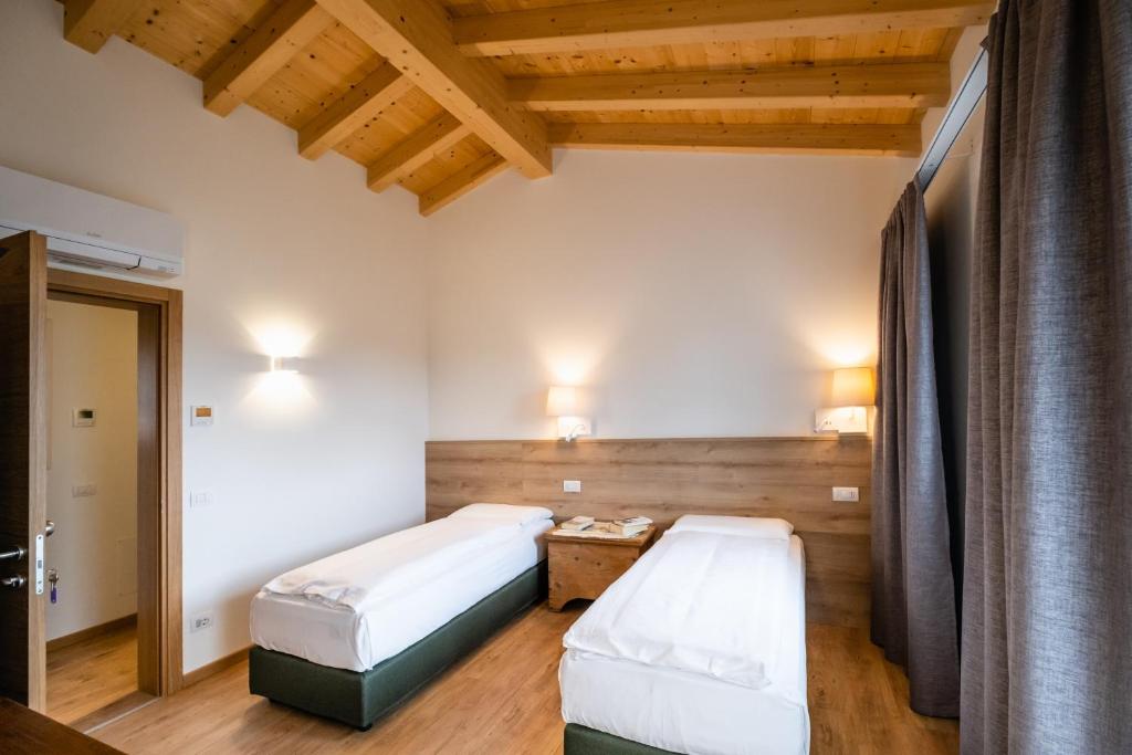 Ein Bett oder Betten in einem Zimmer der Unterkunft Agriturismo al Comarel