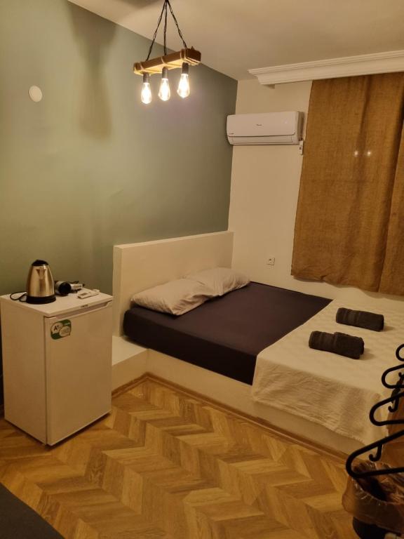 A bed or beds in a room at El Mundo Suites