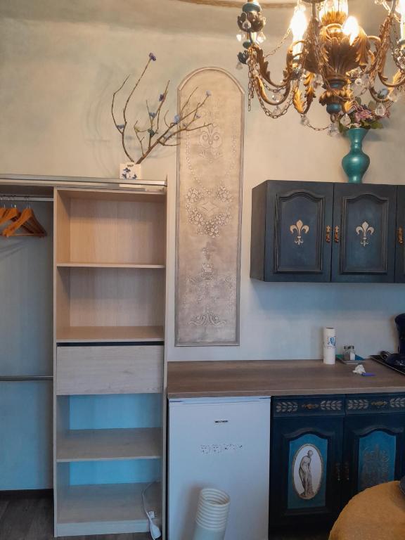 Kuchyň nebo kuchyňský kout v ubytování Penthouse en bleu royal